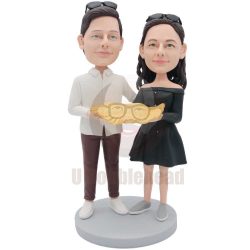 Custom Happy Couple Bobbleheads Holding A Big Dumpling