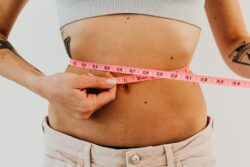 Does a slimming machine improve overall body shape?
